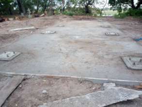 Finished base showing columns encased by slab