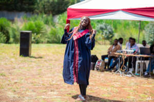 A graduand celebrating her achievement