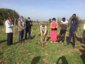 Rev Wambari leading the groundbreaking ceremony