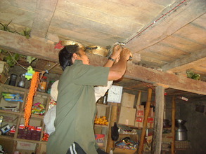 Wiring being installed from box to lamp