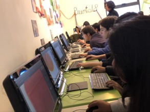 Teenagers creating videogames