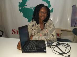 Mariama with her new laptop