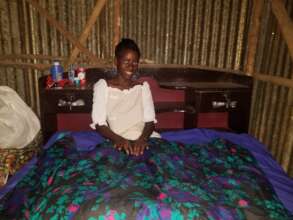 Aminata in her new bed