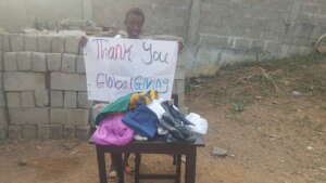 Aminata with her new clothes & shoes