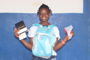 Mariama with her new school supplies
