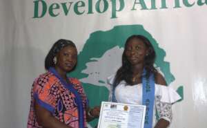 Festina with her computer training certificate