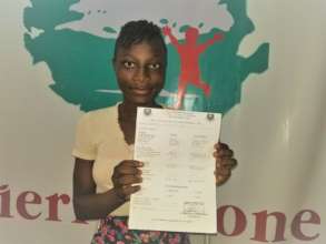 Koterah with her BECE result