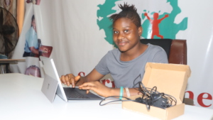 Mariama with her new laptop