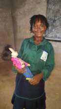 Onike with her new doll