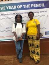 Jeneba, left, volunteering at the distribution