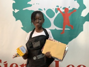 Promise with her new school supplies
