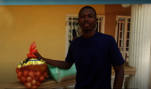 Aminata's dad with the food they received