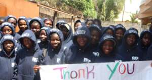 Girls wearing their new sweatshirts