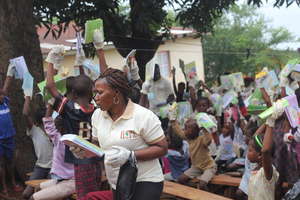 kids happy to receive exercise books