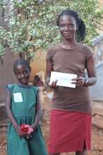 Fatmatta and her mother -scholarship recipient
