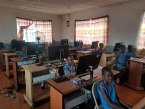 Girls learning in the computer lab