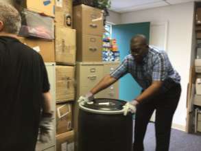 moving drums of school supplies