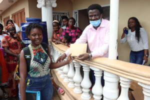 Mariama receiving financial support for school