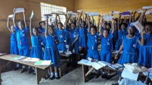 A Stella Maris class showing their new pencils