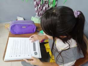 Student with the project workbook
