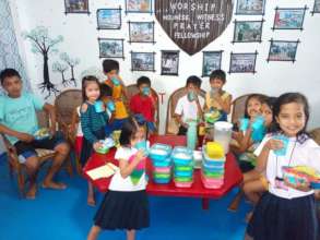 Kids drinking their meals before they go to school
