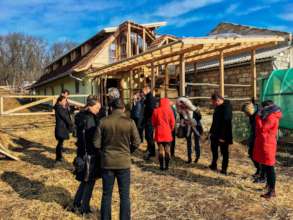 Group visit and nearly finished stable in the back