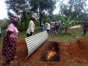 Kenya biochar training with trench & roofing sheet