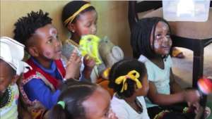 Children enjoying music together at Lonwabo