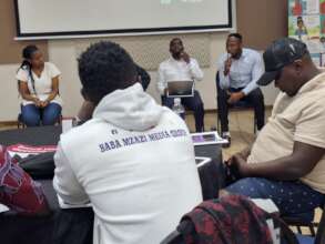 LHR presenting at a community outreach event