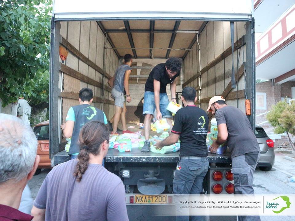 food baskets distribution for refugees in Athens