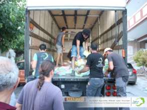 food baskets distribution for refugees in Athens