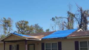 Photos of Dorothy's home with hurricane damage
