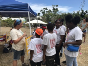 Jennifer Valiulis talking with students about bats