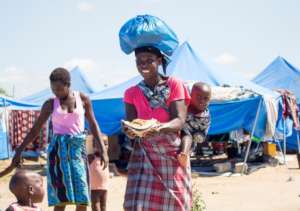 Family in a camp in Beira, Mozambique