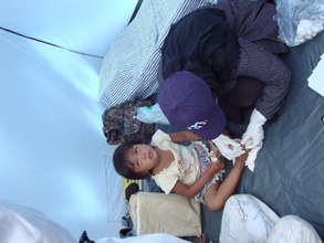 Child being treated by IMC staff