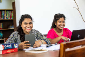 Maya and Rosey working on their English.