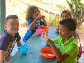 Students enjoying snack together