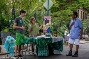 Tabling at a street fair with a green theme
