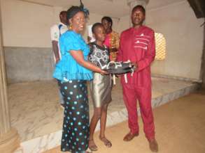 Student receiving school supplies