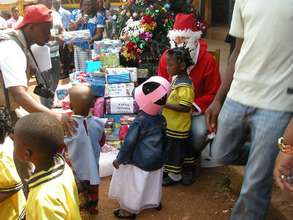 distributing Christmas gifts