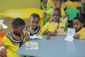 Children reading and enjoying their new books