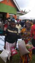 Beneficiaries after receiving seeds for planting