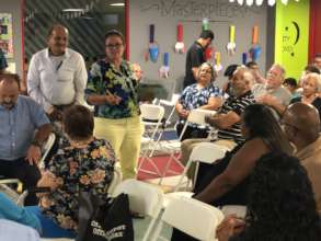 Participants speaking at the gathering