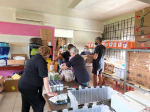 Volunteers sorting PPE