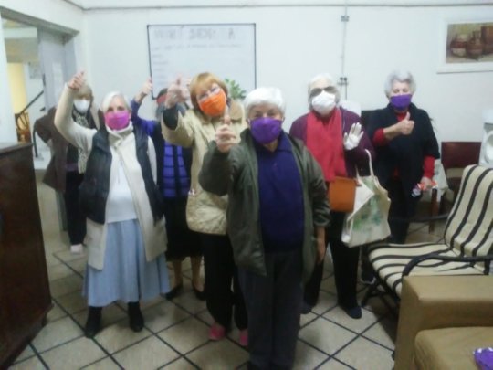 Many ladies receiving their face masks