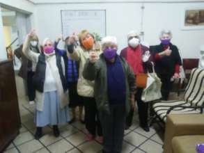 Many ladies receiving their face masks