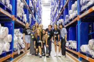 Visiting TAL Apparel's factory with 10 finalists