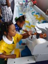 Students play with the Water Table on a Field Trip