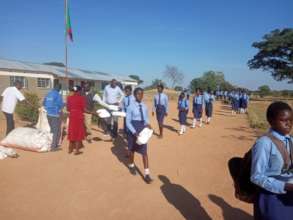 Singwamba Junior Secondary School Receive Textbook