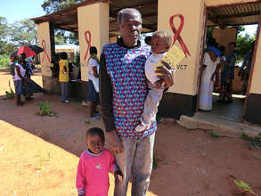 Two young orphans cared for by their grandfather